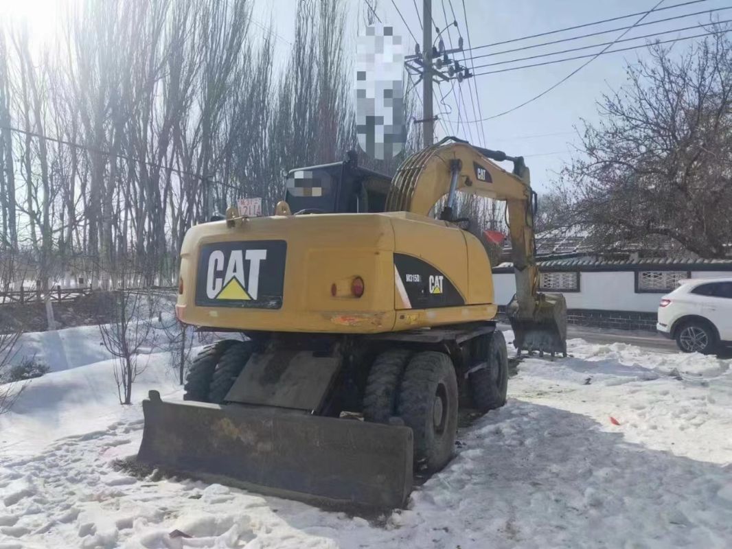 พร้อมทํางาน Caterpillar M315D เครื่องขุดล้อมือสองที่มีเวลาทํางานน้อยและอยู่ในสภาพดี