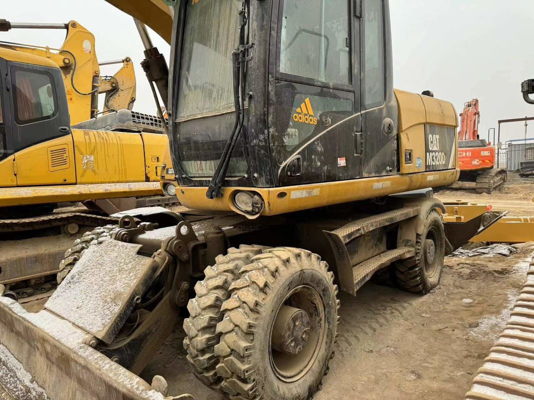 90% Caterpillar M317D2 เครื่องขุดล้อมือสองที่มีคุณภาพสูงและผลงานที่ดีที่สุด สําหรับขาย