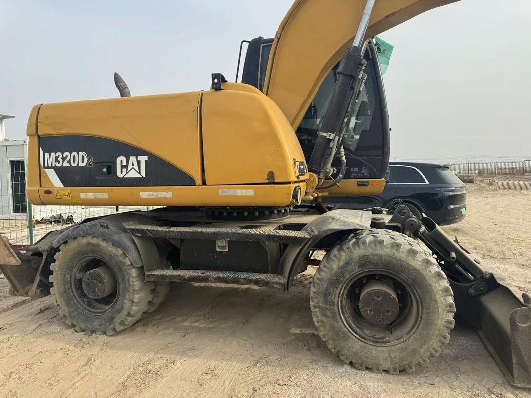 90% Caterpillar M317D2 เครื่องขุดล้อมือสองที่มีคุณภาพสูงและผลงานที่ดีที่สุด สําหรับขาย