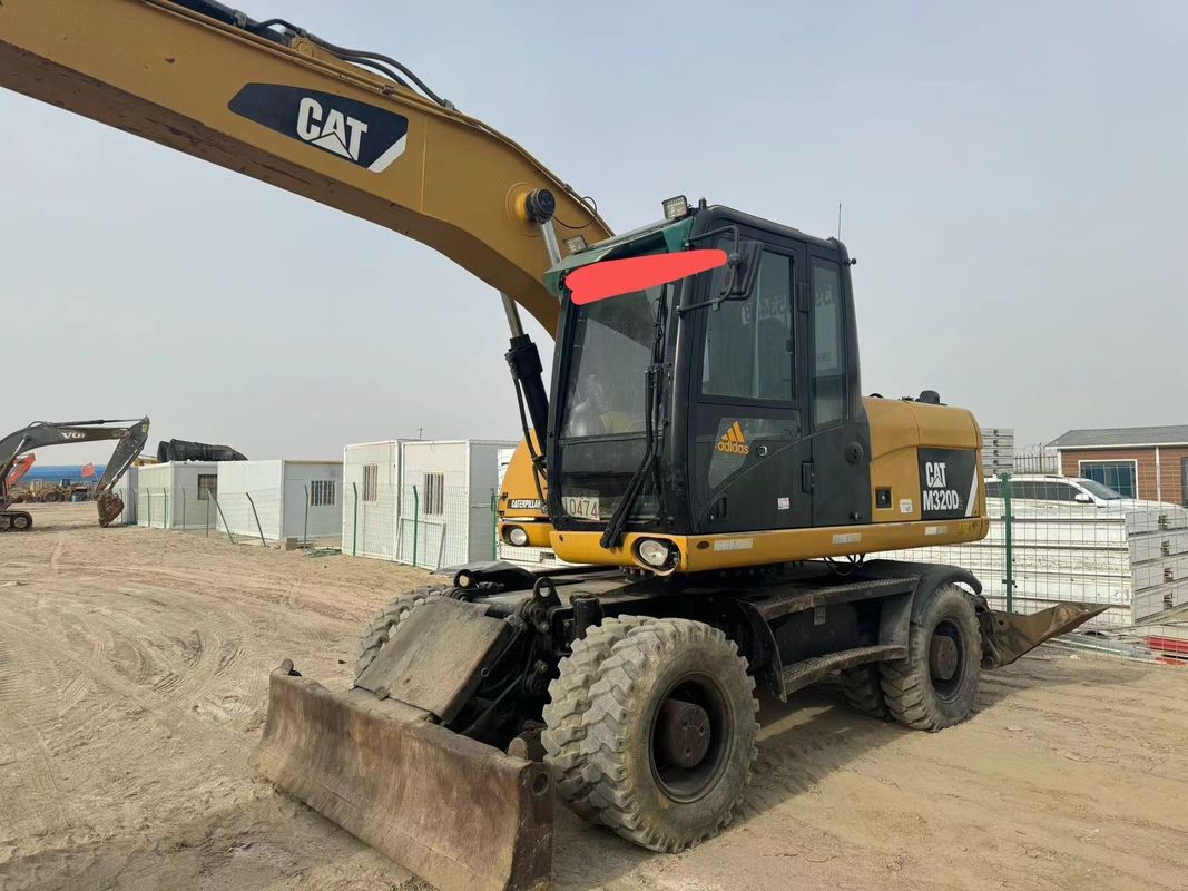 90% Caterpillar M317D2 เครื่องขุดล้อมือสองที่มีคุณภาพสูงและผลงานที่ดีที่สุด สําหรับขาย