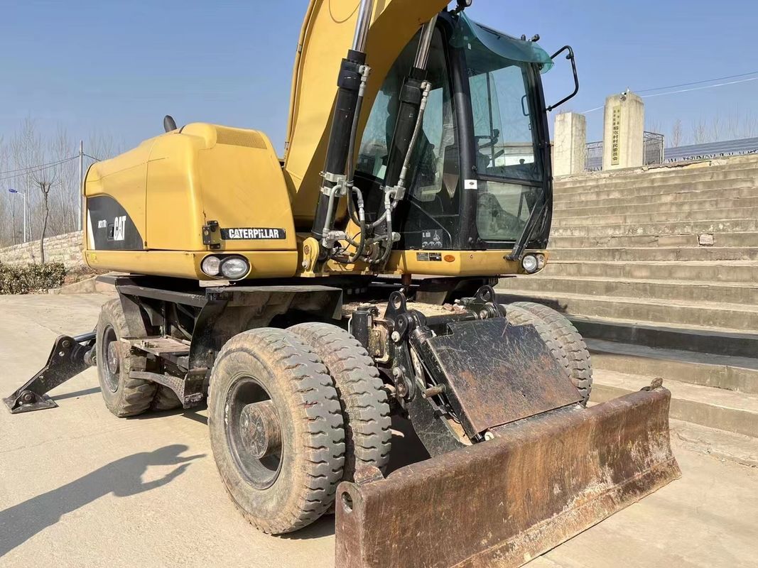 90% Caterpillar M317D2 เครื่องขุดล้อมือสองที่มีคุณภาพสูงและผลงานที่ดีที่สุด สําหรับขาย
