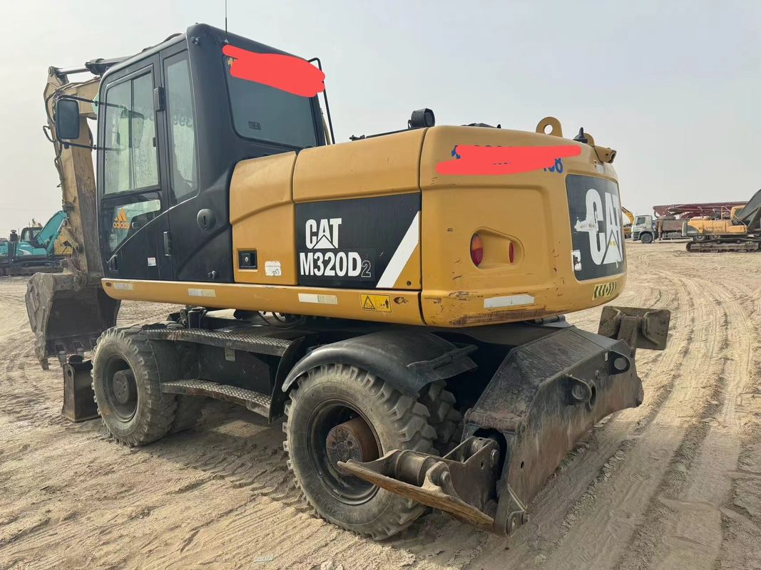 90% Caterpillar M317D2 เครื่องขุดล้อมือสองที่มีคุณภาพสูงและผลงานที่ดีที่สุด สําหรับขาย