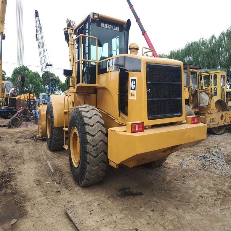 Caterpillar CAT 966G 966 เครื่องบรรทุกล้อ พร้อมการบรรทุกเร็ว 22500 23000 กิโลกรัม น้ําหนักเครื่อง