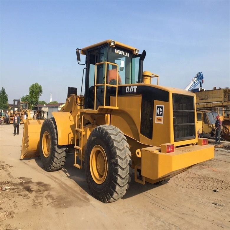 Caterpillar CAT 966G 966 เครื่องบรรทุกล้อ พร้อมการบรรทุกเร็ว 22500 23000 กิโลกรัม น้ําหนักเครื่อง