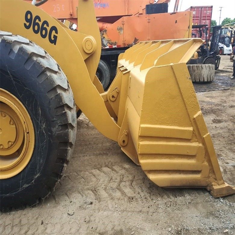 Caterpillar CAT 966G 966 เครื่องบรรทุกล้อ พร้อมการบรรทุกเร็ว 22500 23000 กิโลกรัม น้ําหนักเครื่อง